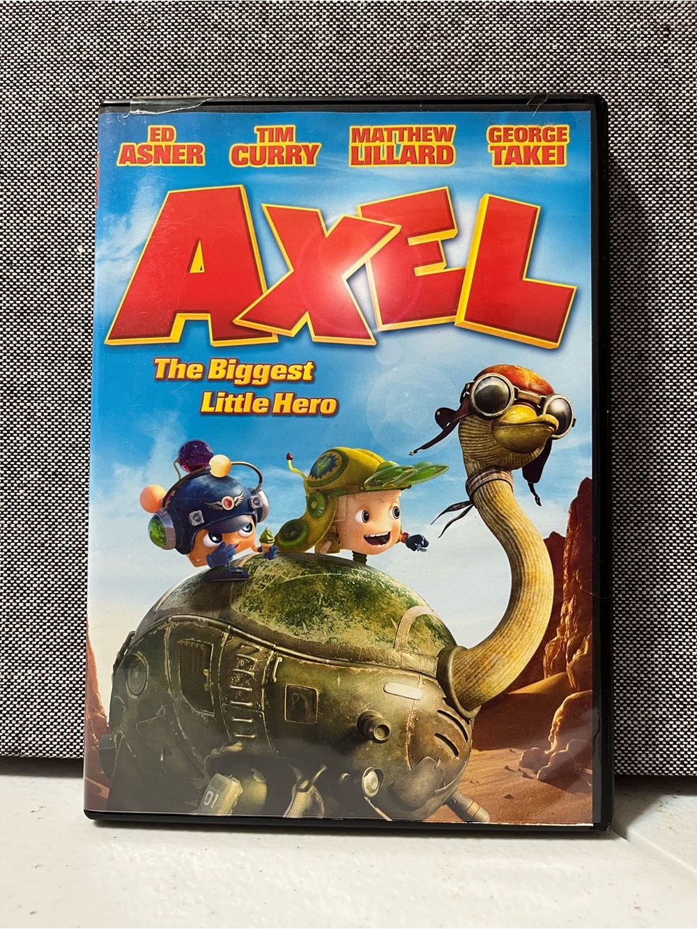 AXEL The Biggest Little Hero DVD - Bright Blue & Red Cover